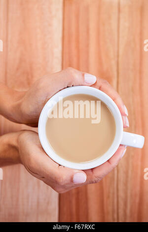 Womans mani tazza di caffè Foto Stock