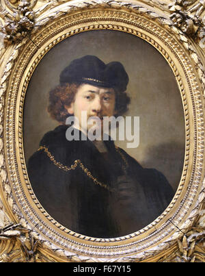 Rembrandt (1606-1669). Pittore olandese. Ritratto di auto che indossa un cappello da cuoco di colore rosso e oro, Ghain olio su pannello. 1633. Il museo del Louvre. Parigi. Foto Stock