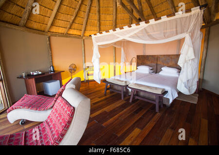 Sossus Dune Lodge capanne di paglia in Sossusvlei, Namibia, Africa Foto Stock