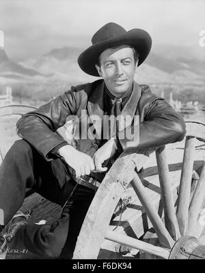 Data di rilascio: maggio 30, 1941. Il titolo del filmato: Billy the Kid. STUDIO: Metro Goldwyn Mayer (MGM). Trama: . Nella foto: Robert TAYLOR come Billy Bonney. Foto Stock