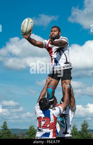 Fijian team player in azione la cattura di sfera in linea. Foto Stock