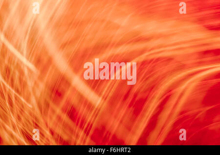 Moto rossa sfocata sullo sfondo delle luci Foto Stock