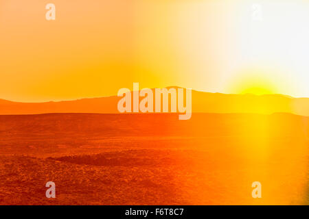 Tramonto sul paesaggio del deserto Foto Stock