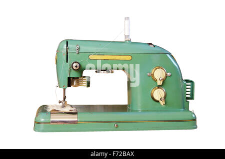Vecchia macchina da cucire isolato sul telefono bianco Foto Stock