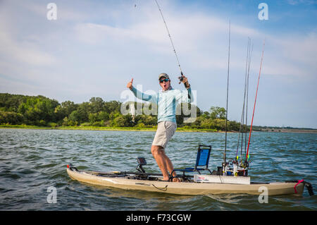 Pollice su per la pesca Foto Stock