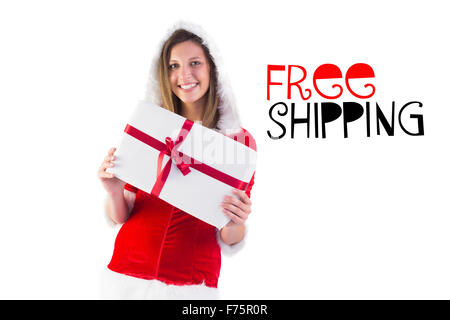 Immagine composita di pretty santa ragazza regalo di contenimento Foto Stock