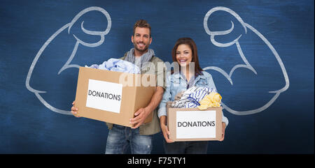 Immagine composita del ritratto di una felice coppia giovane con vestiti donazione Foto Stock