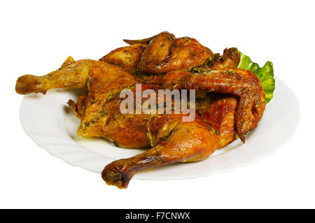 Pollo arrosto sulla piastra, isolato su sfondo bianco Foto Stock