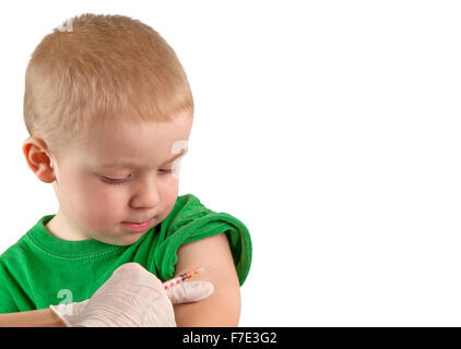 Fotografia macro di un medico la vaccinazione di un bambino Foto Stock