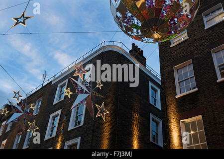 Le decorazioni di Natale in Carnaby Street, London, England, Regno Unito Foto Stock