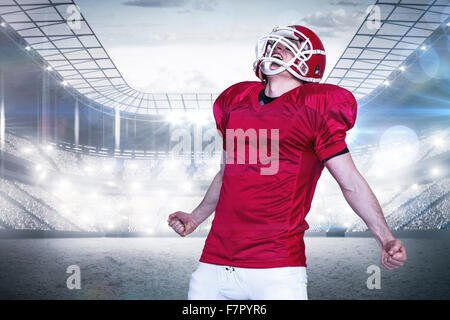 Immagine composita di un trionfo di un giocatore di football americano Foto Stock