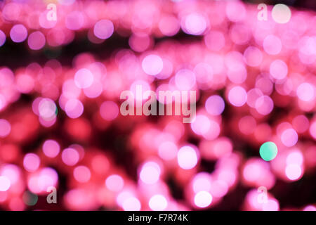 Rosa luci festose in Bokeh di fondo Foto Stock