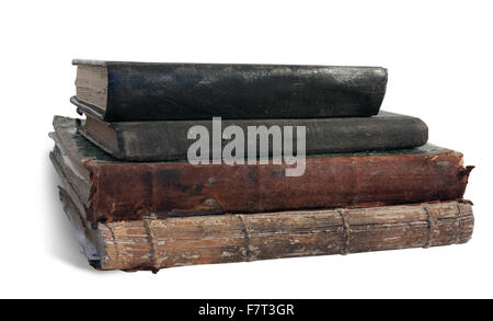 Quattro, vecchi libri. Isolato su bianco con tracciato di ritaglio Foto Stock