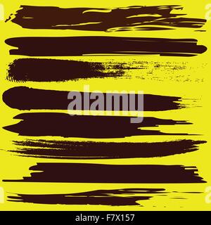 Set di vettore di grunge pennellate su sfondo giallo Illustrazione Vettoriale
