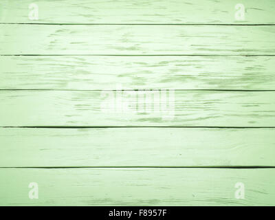 Sfondo di legno verniciato in colore verde chiaro. Foto Stock