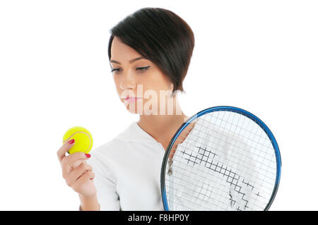 Ragazza giovane con la racchetta da tennis e bal isolato su bianco Foto Stock