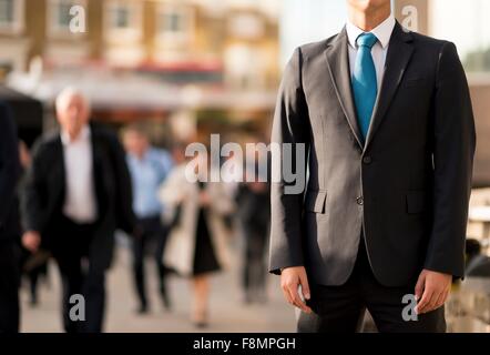 Imprenditore della tuta, parzialmente oscurata, London, Regno Unito Foto Stock