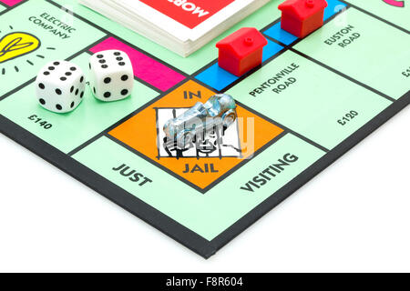 Gioco di monopoli - Edizione in lingua inglese di monopolio che mostra la prigione, il classico gioco di scambi commerciali da Parker Brothers Foto Stock