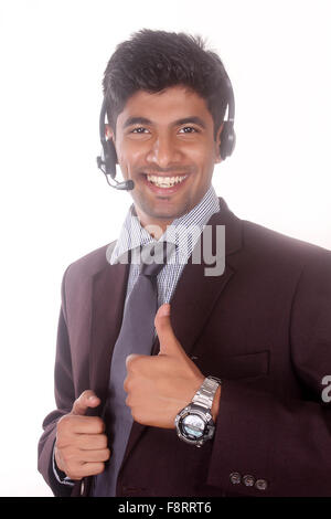 Sorridente giovane call center executive Foto Stock