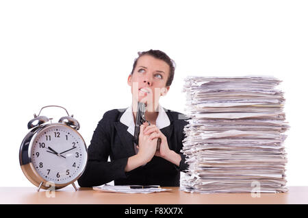 Donna con la pistola sotto stress da scadenze Foto Stock