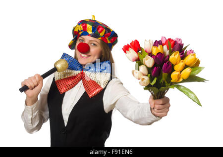 Bella femmina clown con fiori isolati su bianco Foto Stock