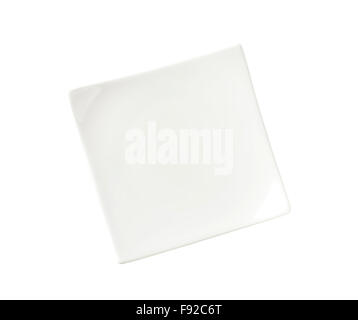 Small square white porcelain plate Foto Stock