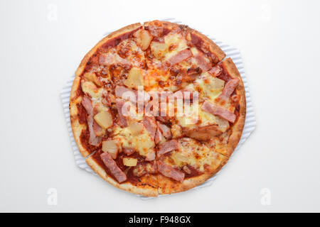 Pizza prosciutto ananas Foto Stock