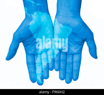 Le mani con il Sud America, Mappa di Sud America disegnato. Il tuo mondo nelle tue mani, sfondo bianco Foto Stock