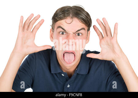 Adolescente nerd ragazzo che si affaccia isolata in bianco Foto Stock