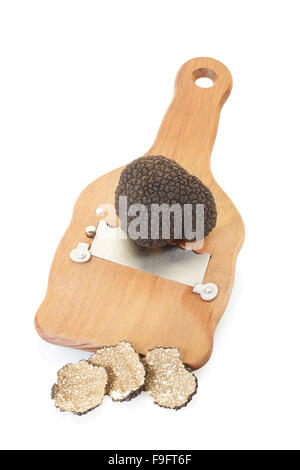 Tartufo nero, fette e tartufo di legno Tagliatutto Foto Stock