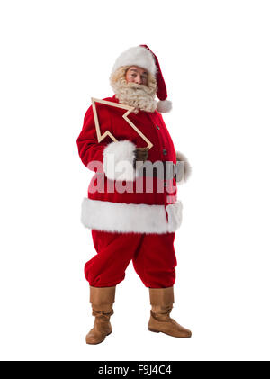 Santa Claus tenendo premuto freccia in legno e che mostrano la direzione a piena lunghezza Ritratto isolato su sfondo bianco Foto Stock