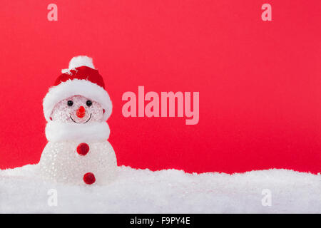 Pupazzo di neve con le palle di Natale Foto Stock