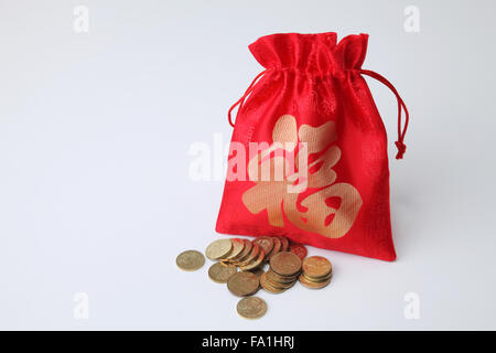 Lucky borsa con denaro dal lato Foto Stock