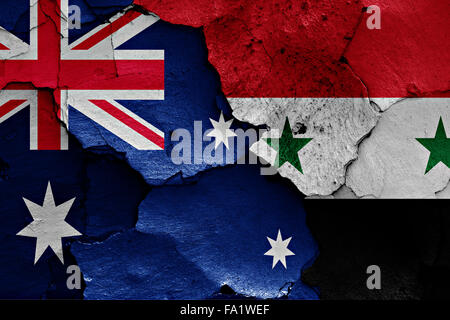 Bandiere di Australia e Siria dipinta sulla parete incrinato Foto Stock