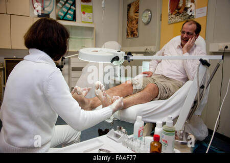 Pedicure durante la podologia. Foto Stock