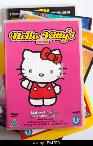Pila di DVD con Hello Kitty Hello Kitty's Paradise DVD sulla parte superiore Foto Stock