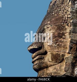 Close-up di sorridente faccia di pietra, tempio Bayon, Angkor, Siem Reap, Cambogia Foto Stock