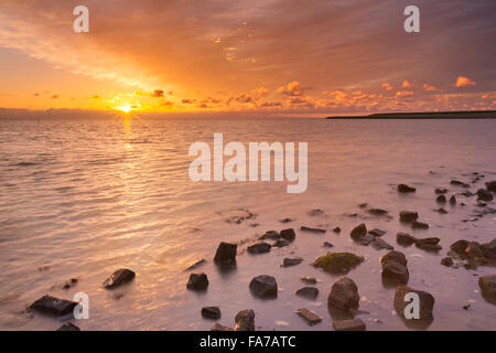 Tramonto sul mare sull'isola di Texel in Olanda. Foto Stock