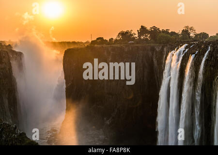 Tramonto a Victoria Falls in Zambia Foto Stock