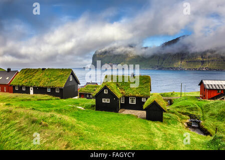 Villaggio di Mikladalur situato sull isola di Kalsoy, Isole Faerøer, Danimarca Foto Stock