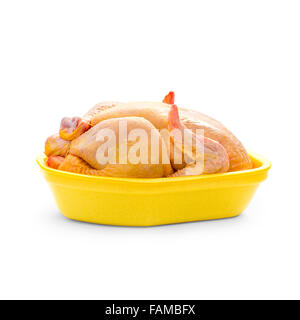 Pollo nutrito con mais in giallo il confezionamento di vassoio su sfondo bianco Foto Stock