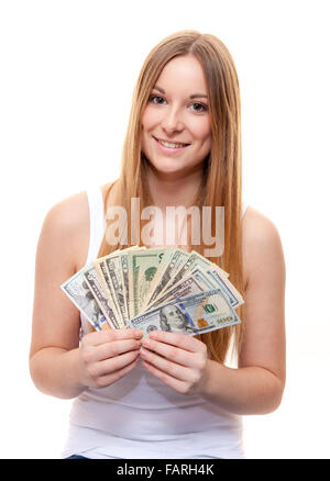 Attraente giovane donna holding dollar note. Tutto su sfondo bianco. Foto Stock