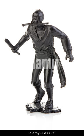 Arrabbiato pirata con un coltello in mano close-up isolato su bianco . Statuetta in miniatura di un giocattolo per bambini è. Foto Stock