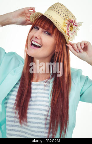 Ritratto di un sorridente hipster donna che indossa hat Foto Stock