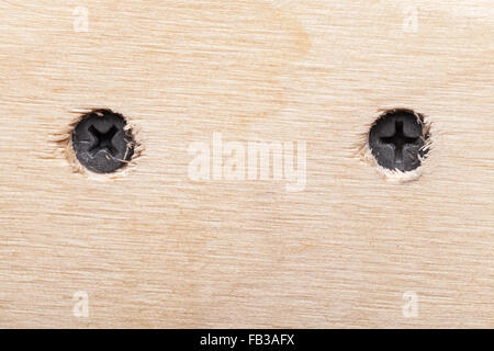 Due viti in legno ruvido plank foto macro Foto Stock