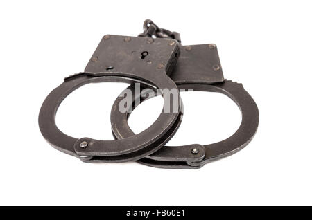 Acciaio manette nero su sfondo bianco Foto Stock