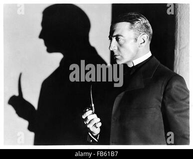 Pubblicità fotografia mostrante Clive Brook nel ruolo di Sherlock Holmes rilasciato a promuovere "il ritorno di Sherlock Holmes' 1929 film diretto da Basil Dean. Vedere la descrizione per maggiori informazioni. Foto Stock