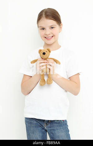 Teen ragazza con un giocattolo bear Foto Stock