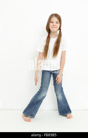 Sorridente bambina con la bellezza dei capelli Foto Stock