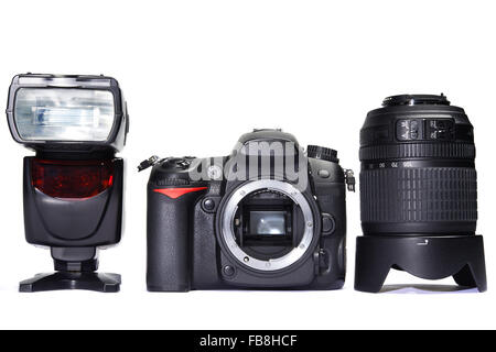 Una serie di fotografie. Fotocamera reflex digitale, la lente e il flash Foto Stock